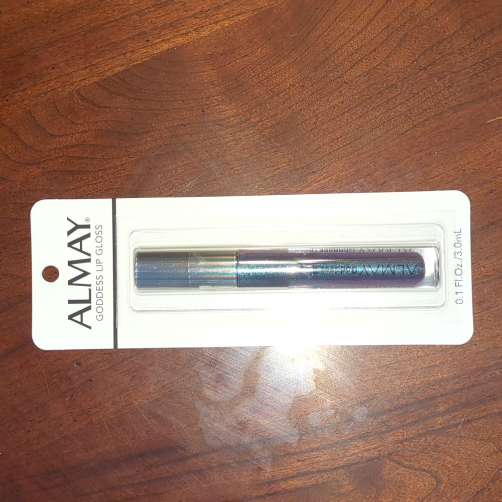 Almay goddess high shine lip gloss deep blue glitter